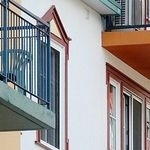Остекление балконов с выносом: современные способы и технологии